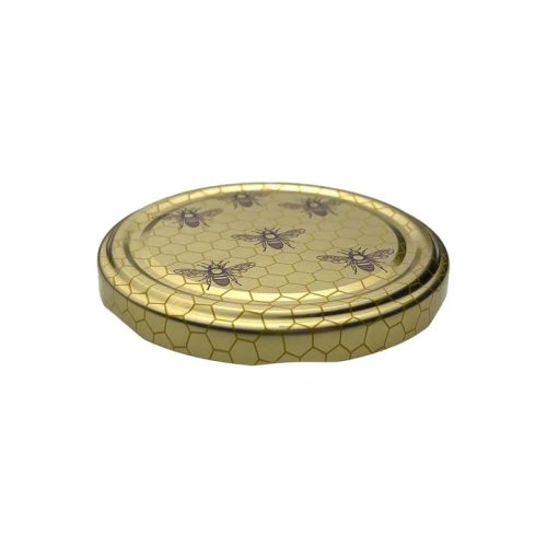 Couvercles dorés avec motif abeille – Pour un pot de miel qui incarne l’élégance, la nature et l’authenticité